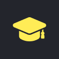 Yellow graduation cap on dark background.