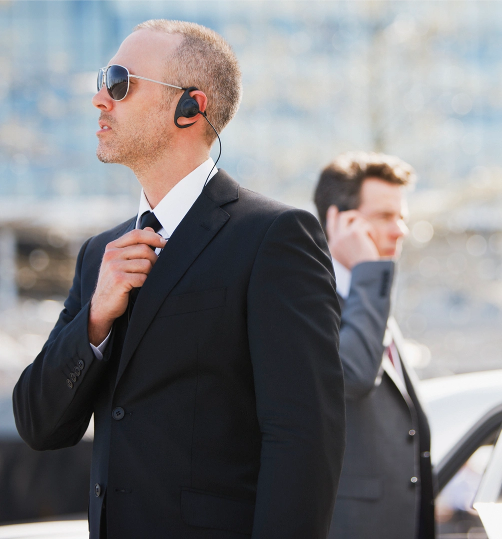 Two men in suits on duty