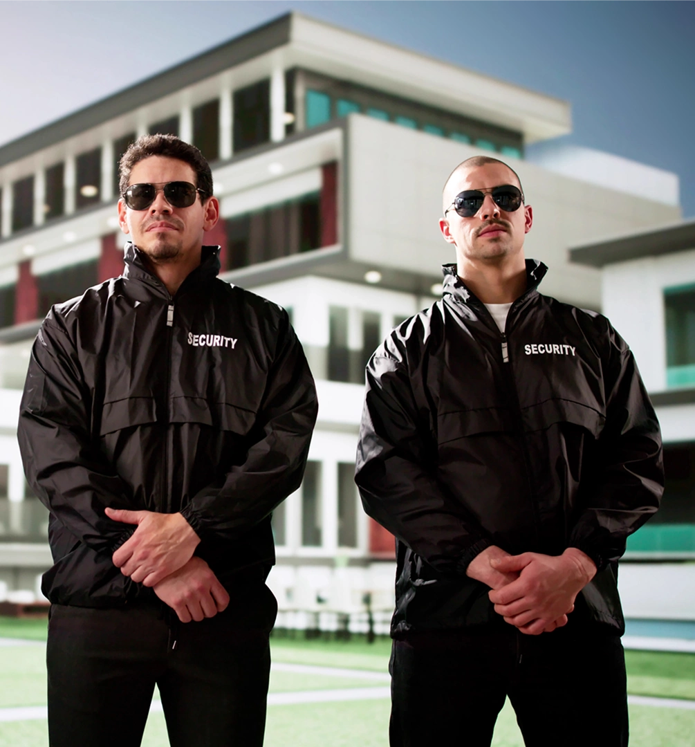 Building entrance with two security personnel