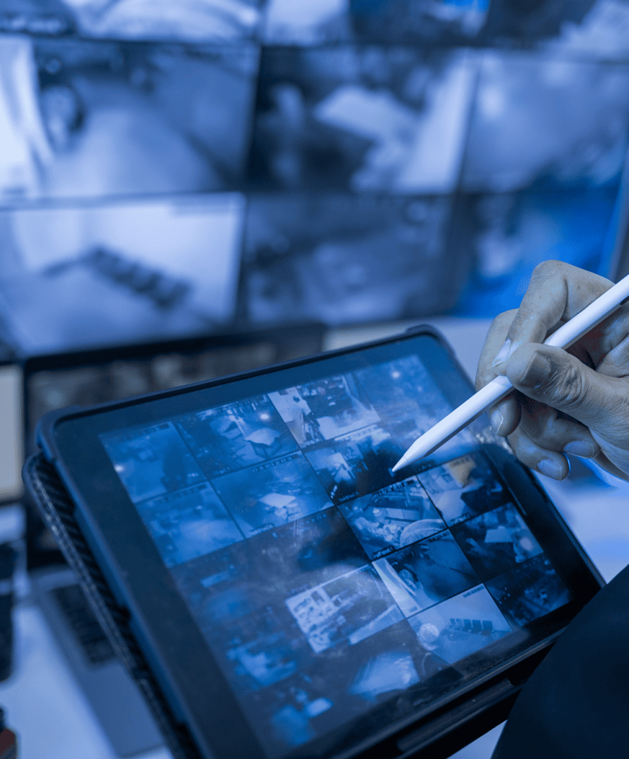 Tablet displaying multiple security camera feeds.
